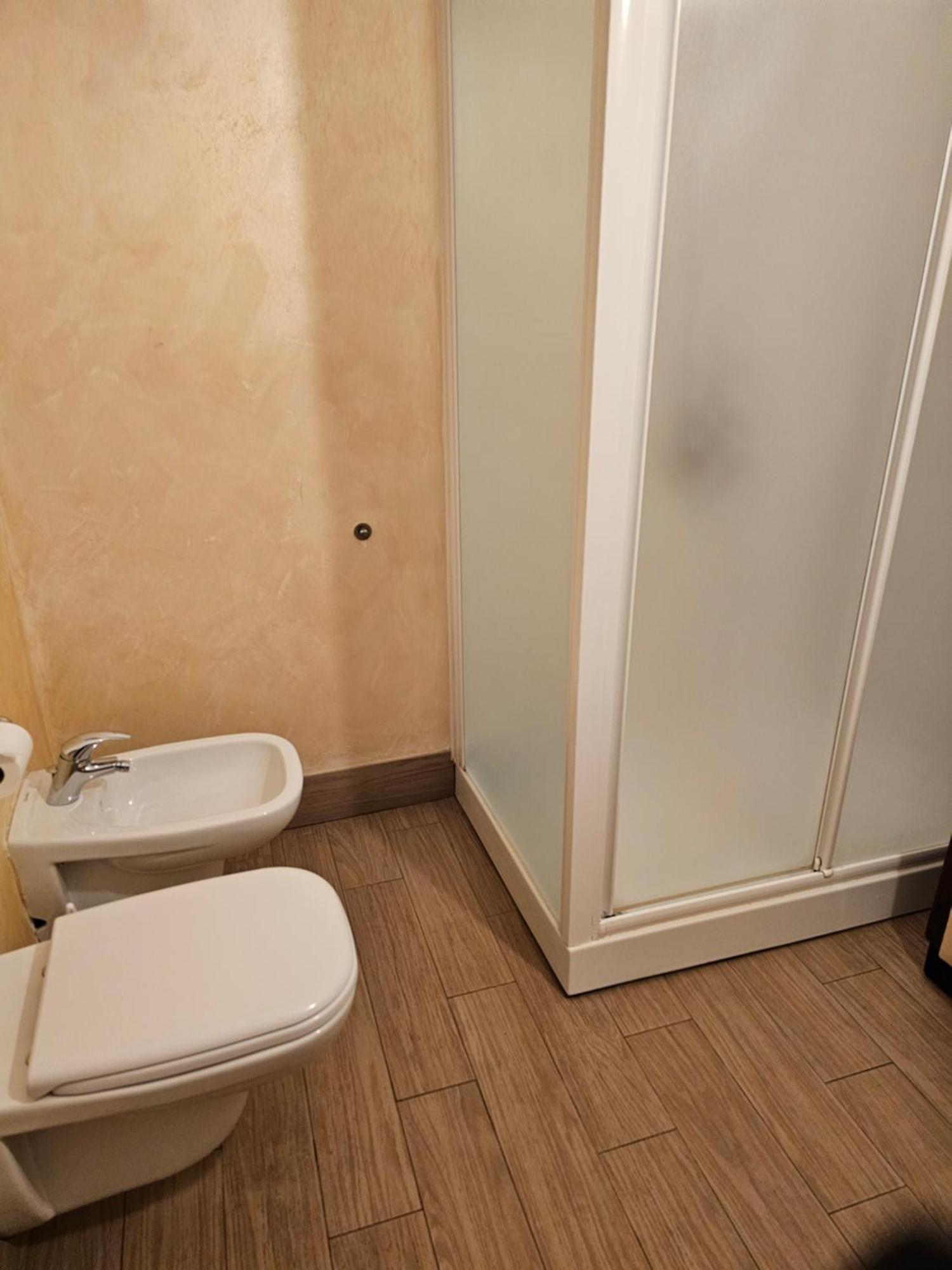 Camera Familiare con Bagno in Comune